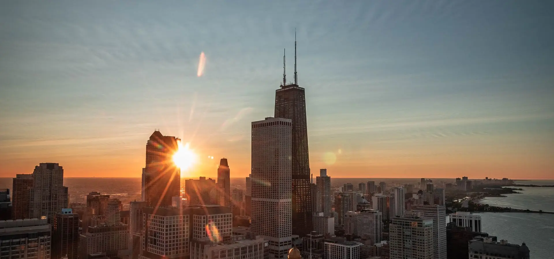 The Chicago skyline at sunset, looking toward the John Hancock Center and Lake Michigan